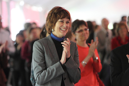 Heather Munroe-Blum laughs during a speech given by Michael Di Grappa during yesterday's celebration of her tenure as Principal. / Photo: Owen Egan