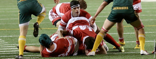 Redmen ruggers protect the ball during their 43-3 win over Sherbrooke last night. / Photo: Derek Drummond