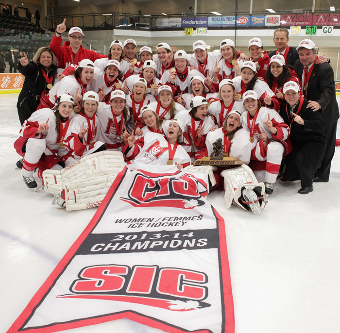 The McGill Martlets celebrate their 2014 national championship victory in Fredericton. / Photo: Keith Minchin, courtesy St. Thomas University