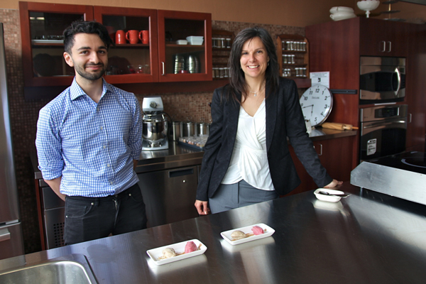 Frisson team members Jonathan Khouzam and Karine Paradis and samples of the almond-pistachio and hibiscus-ginger Frisson frozen dessert. / Photo: Neale McDevitt