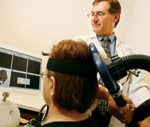 Dr. Howard Chertkow performs transcranial magnetic stimulation (TMS), a non-invasive procedure that stimulates brain activity. Chertkow's research explores the therapeutic potential of TMS in treating Alzheimer's disease.