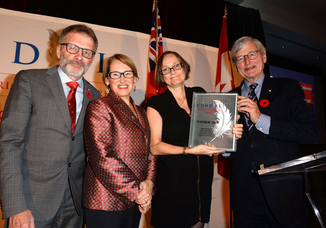 Winning author, Susan Pedersen (wearing black dress), is flanked by (from left to right) Professor Hudson Meadwell, Administrative Chair of the Cundill Prize; Professor Suzanne Fortier, Principal of McGill; and Michael A. Meighen. / Photo: Tom Sandler
