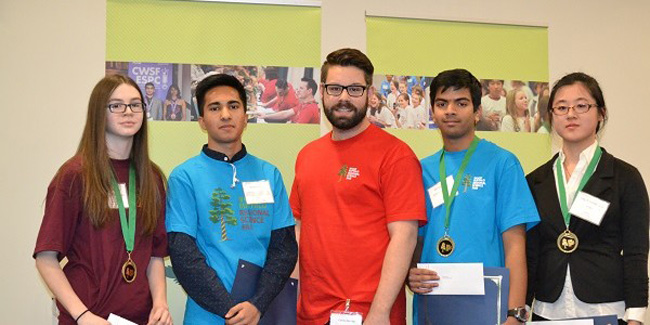 From left to right: Mackenzie Guy, Dhrumil Shah, Corey Conroy (Canada Youth Science), Dhvani Patel and Linda Guo