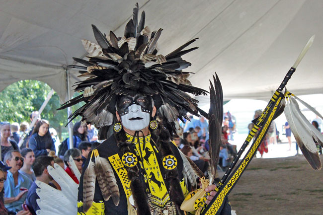 Red white and blue face paint, At the Pow Wow. Kids got the…