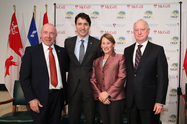 From left to right: McGill benefactor Larry Tanenbaum, Prime Minister Justin Trudeau, Principal Suzanne Fortier and Montreal Neurological Institute Director, Guy Rouleau at today's announcement. / Photo: Owen Egan