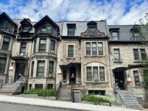 Facades of McGill daycare buildings on Peel Street