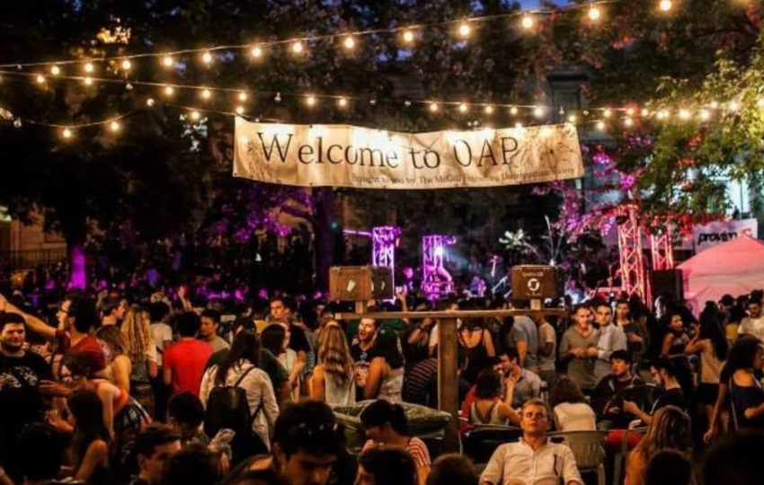 An outdoor banner says "Welcome to OAP."