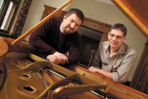 Chris Smythe (left) and Kerry Wagner rely mostly on their ears to determine when a piano is in tune. / Photo: Owen Egan