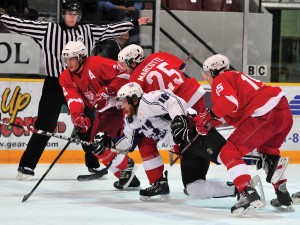 Charge of the Redmen light brigade (L to R): Linemates Guillaume Doucet, Simon Marcotte-Legare and Eric L'Italien charge across the blueline in McGill’s 4-3 victory over Western at the CIS men's hockey championship tourney. / Photo courtesy of Lakehead University