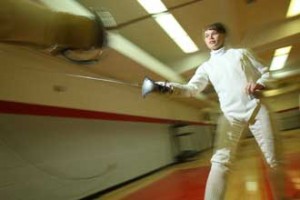 Fencer Erin Olson specializes in the sabre event in which points are scored using the entire surface of the blade. / Photo: Owen Egan