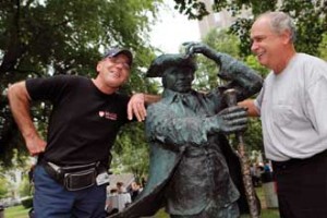 McGill plumber Steve Lewis (right) introduces new colleague Gary Richard, who started in March, to  James McGill during the Campus Community Kick-Off Breakfast on Aug. 26. / PHOTO: Owen Egan